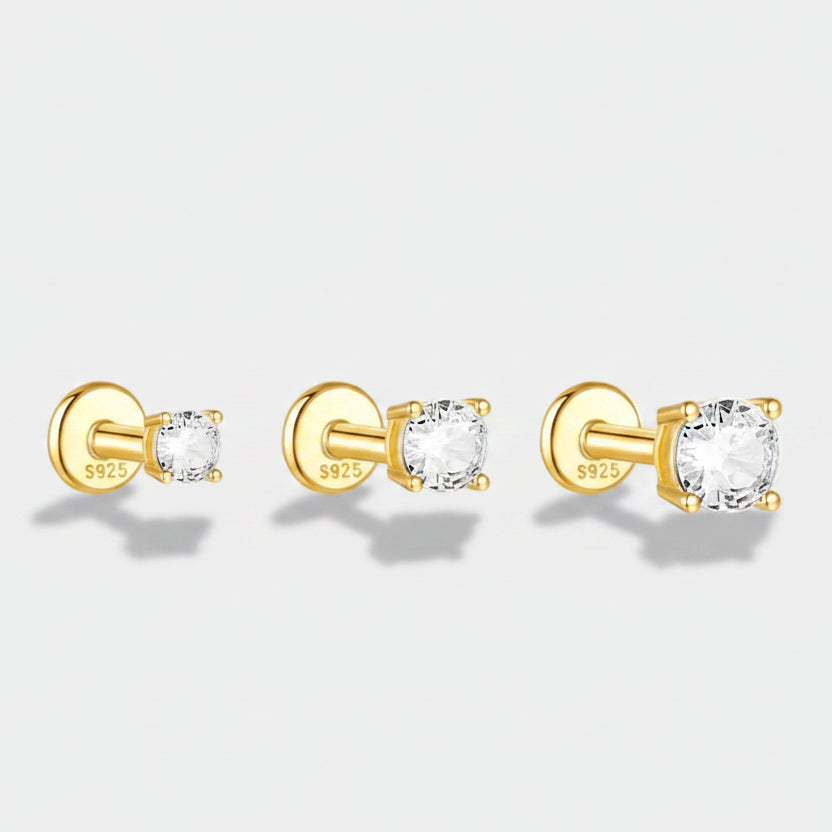 Evelína – Delicate gold earrings with elegant curves.