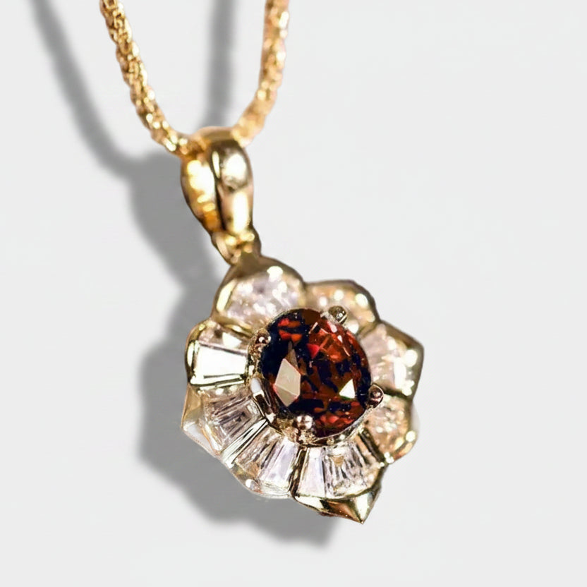 Kristýna – Gold ring with ruby and floral design.