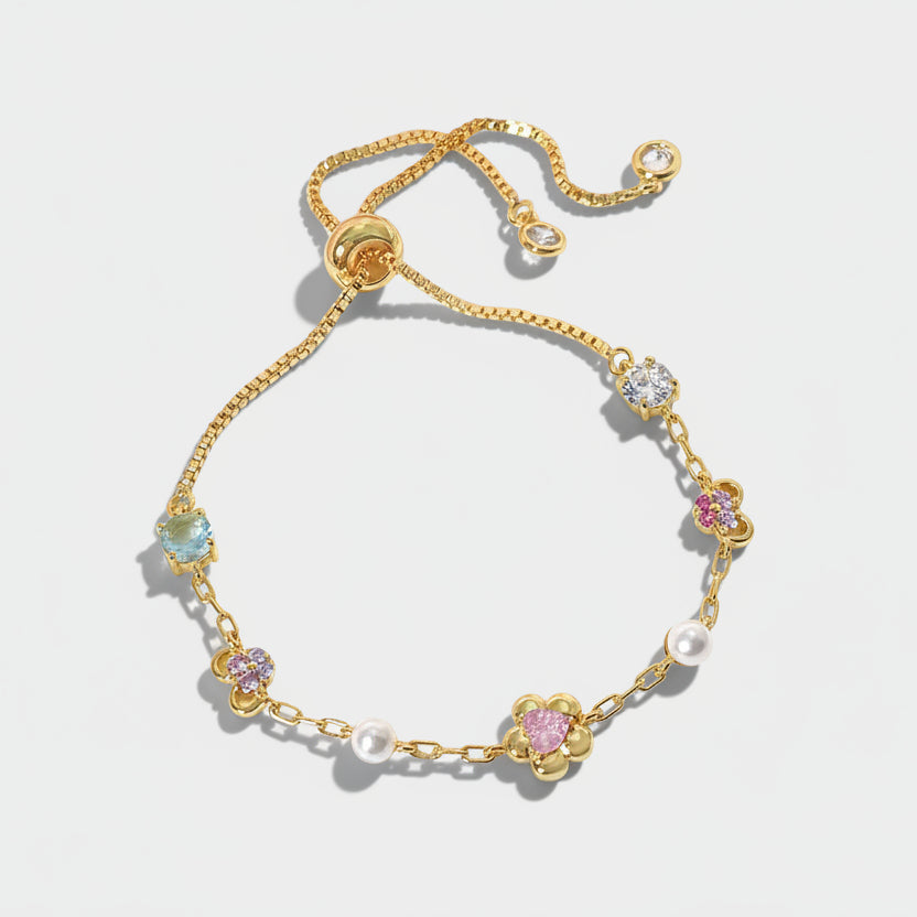 Dorota – Sculptural gold earrings with pearl terminals.