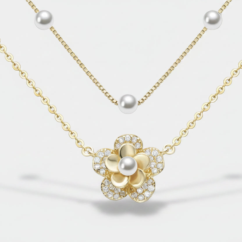 Paul-Marie – Gold earrings with pearl edge.