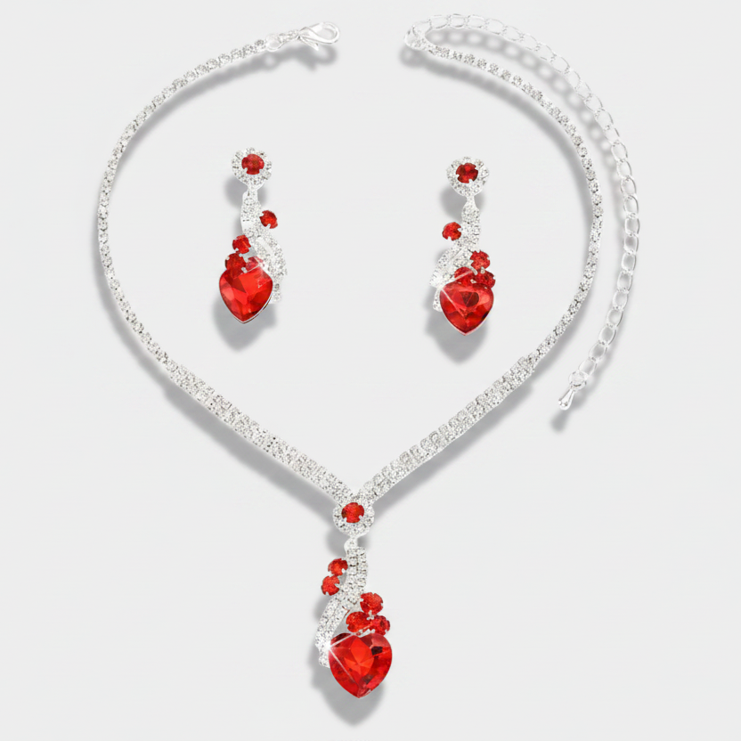 Ingrid – Set with rubies and golden highlights.