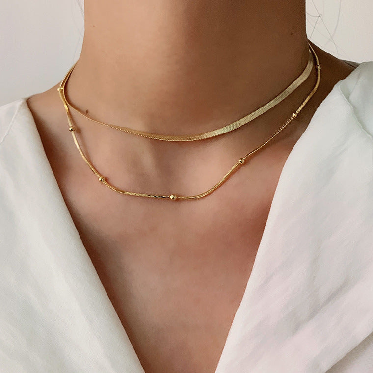 Klára – A simple two-layer gold necklace with a modern shine.