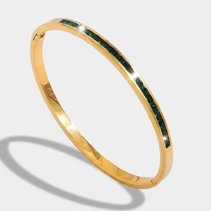 Leonora – Gold-plated bracelet with emeralds.