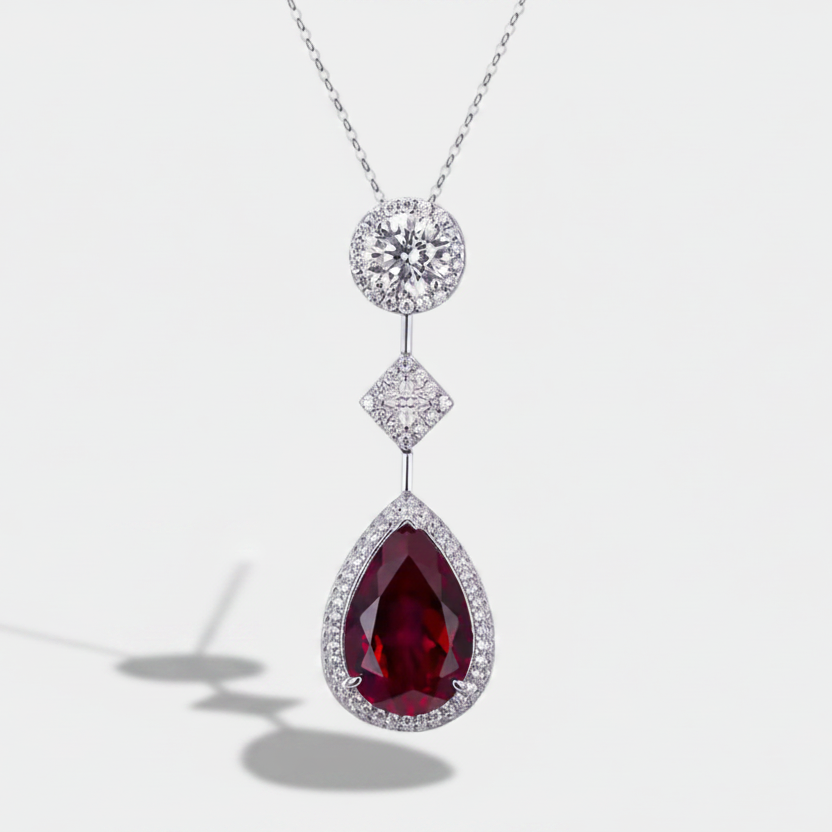 Pia – Pendant with ruby and delicate crystal setting.