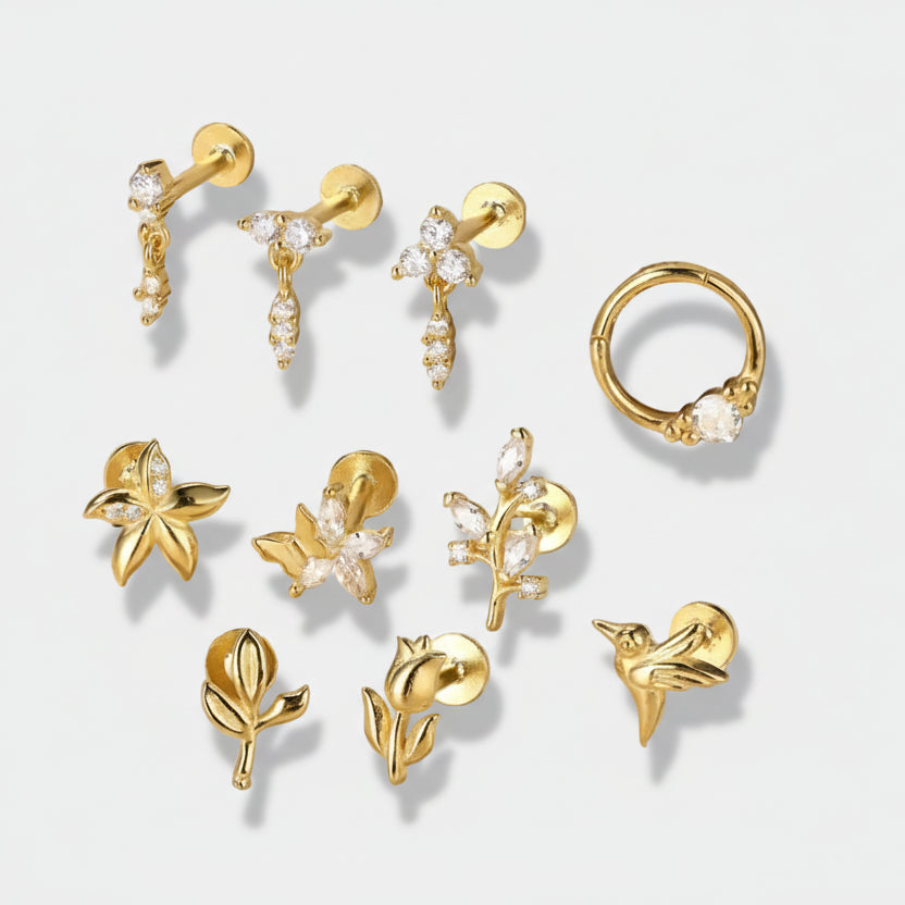 Elisa – golden earrings with geometric accent.