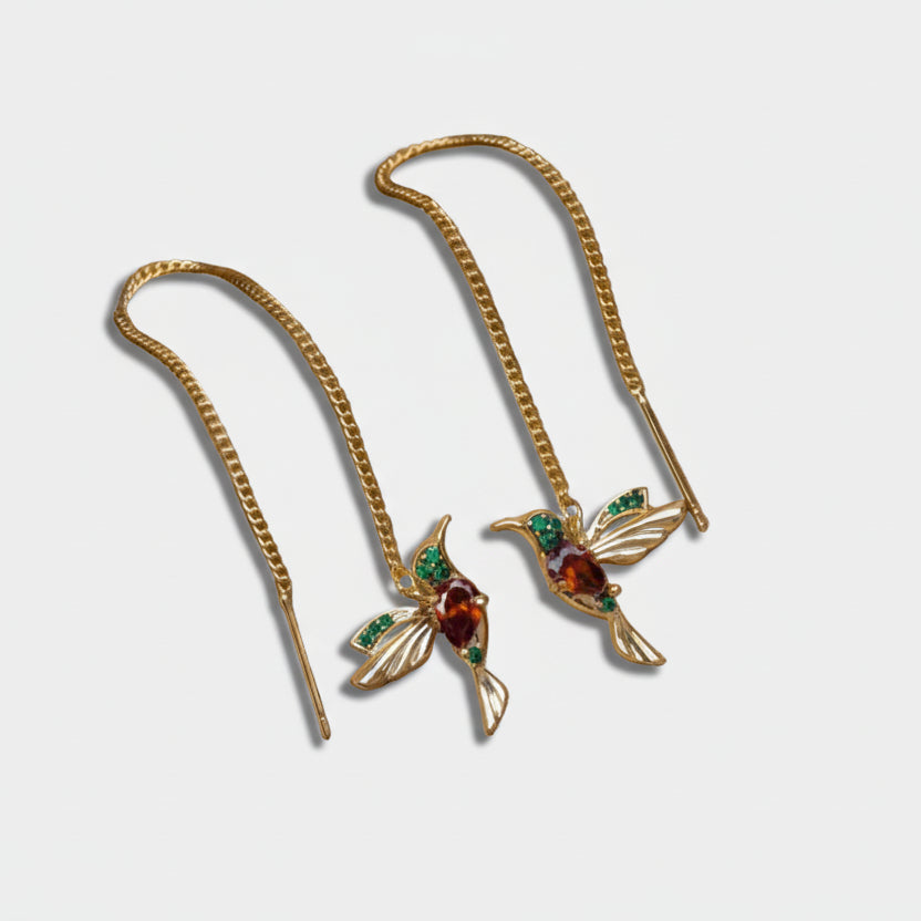 Gold rings with a delicate pendant