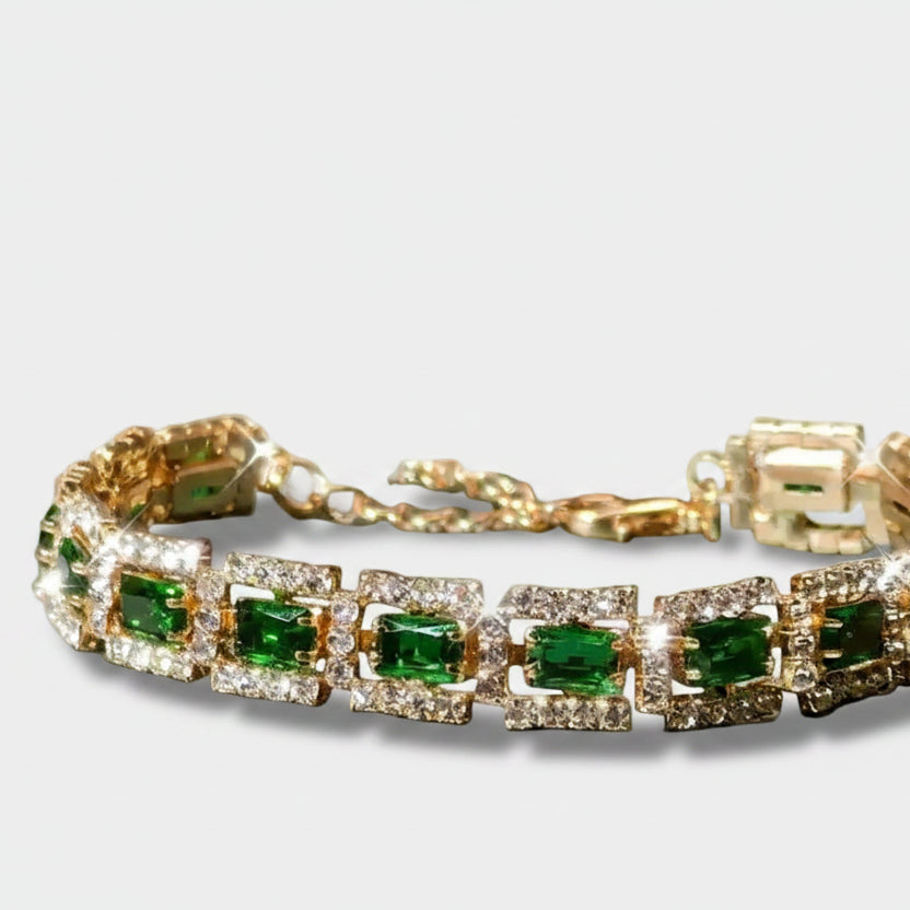 Josefína – Gold bracelet with rectangular emeralds.