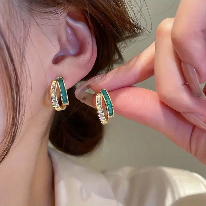 Karina – Square design emerald earrings.