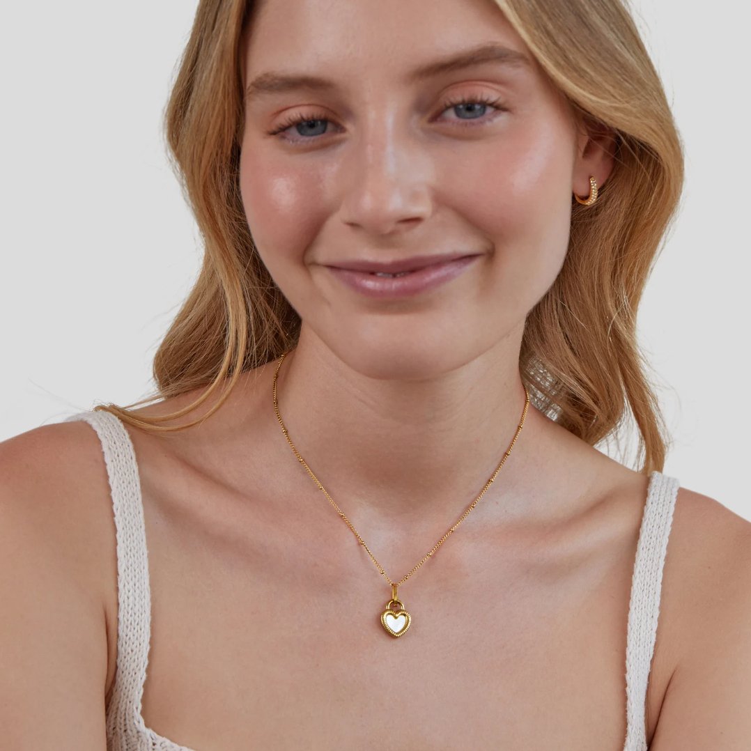 Monika – Warm gold drop pendant.