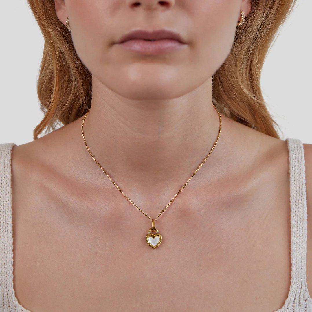 Monika – Warm gold drop pendant.