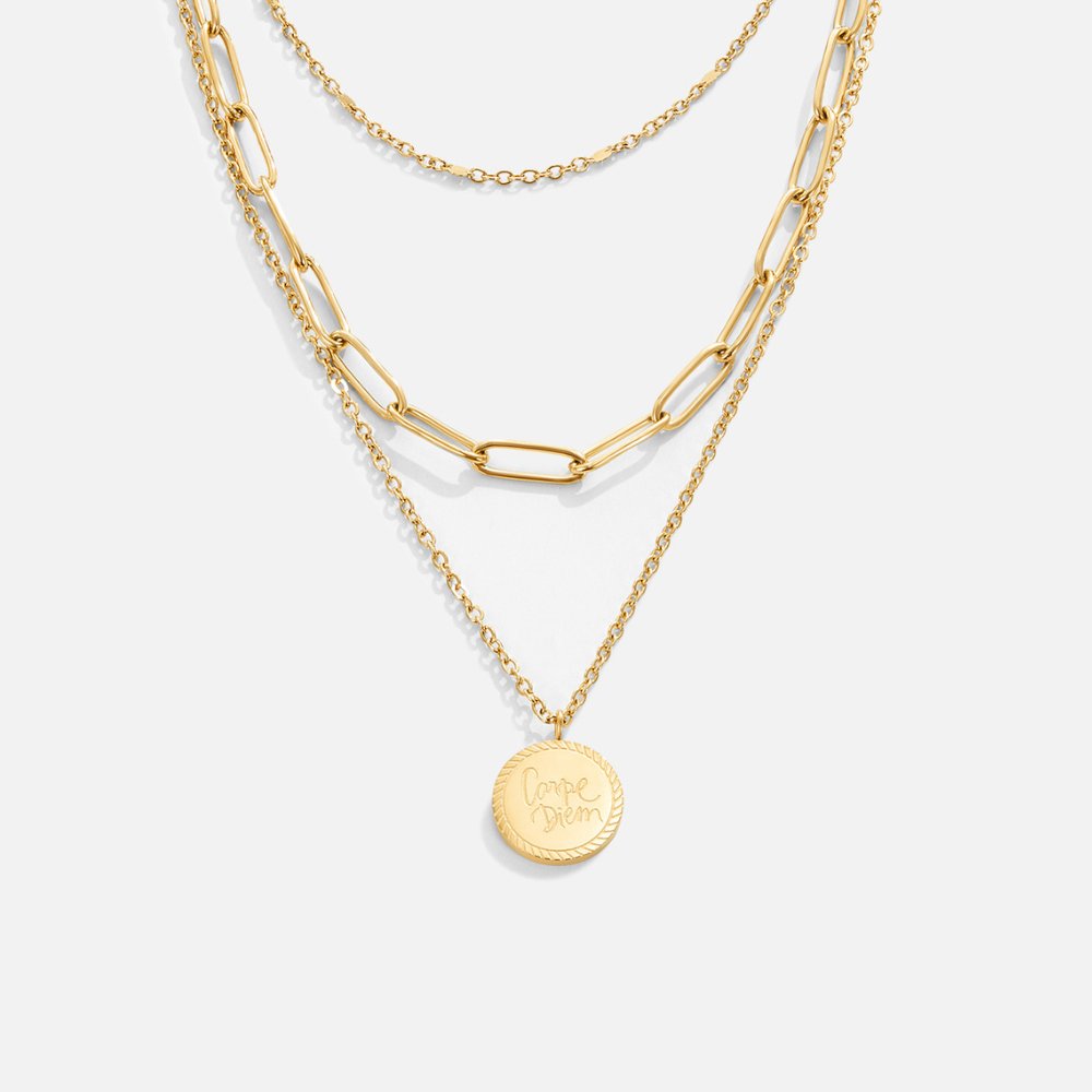 Lea – Una delicata collana multistrato in oro dalle linee eleganti.