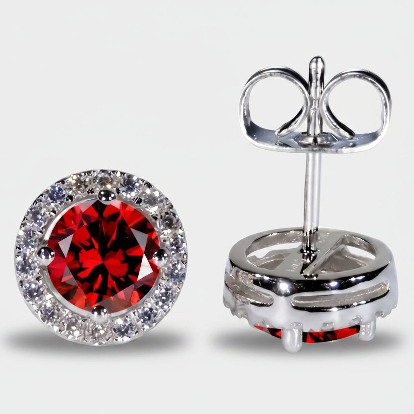 Luisa – Ruby earrings with sun motif.