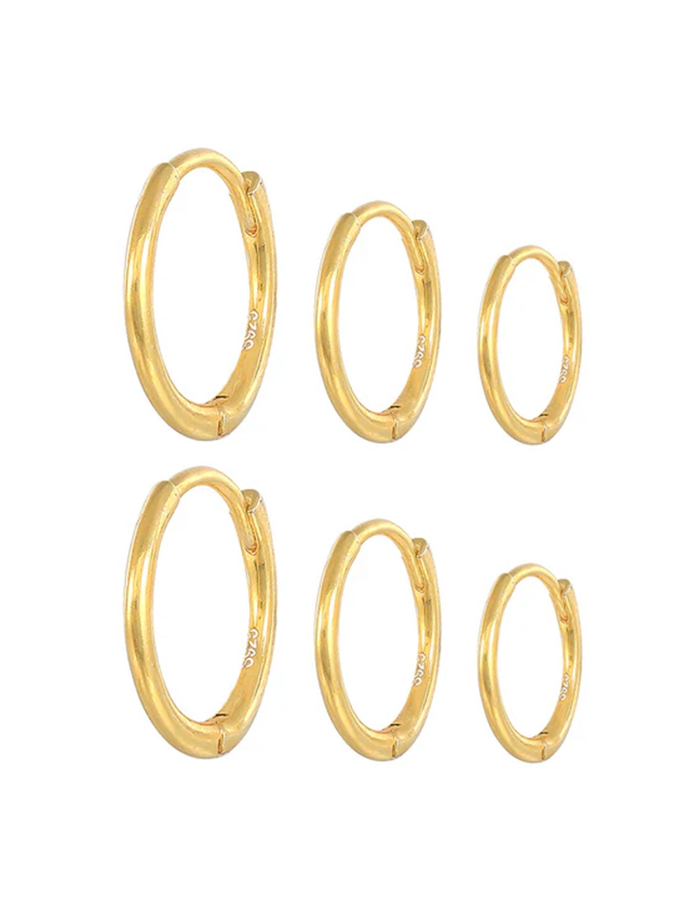 Emilie – Delicate gold earrings with a soft shine.