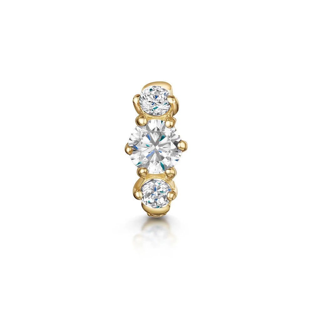 Frieda – Delicate gold earrings with a playful touch.