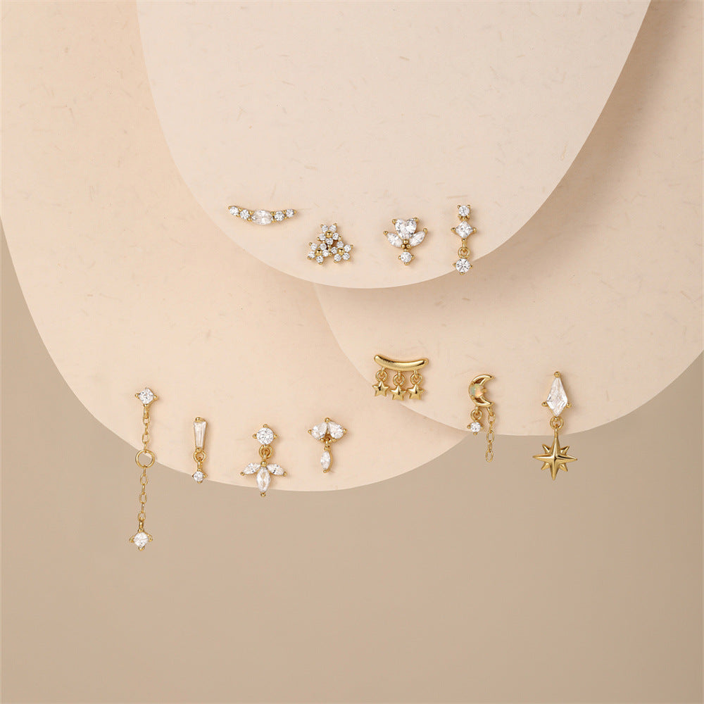 Valentina – delicate golden earrings with a soft curve.