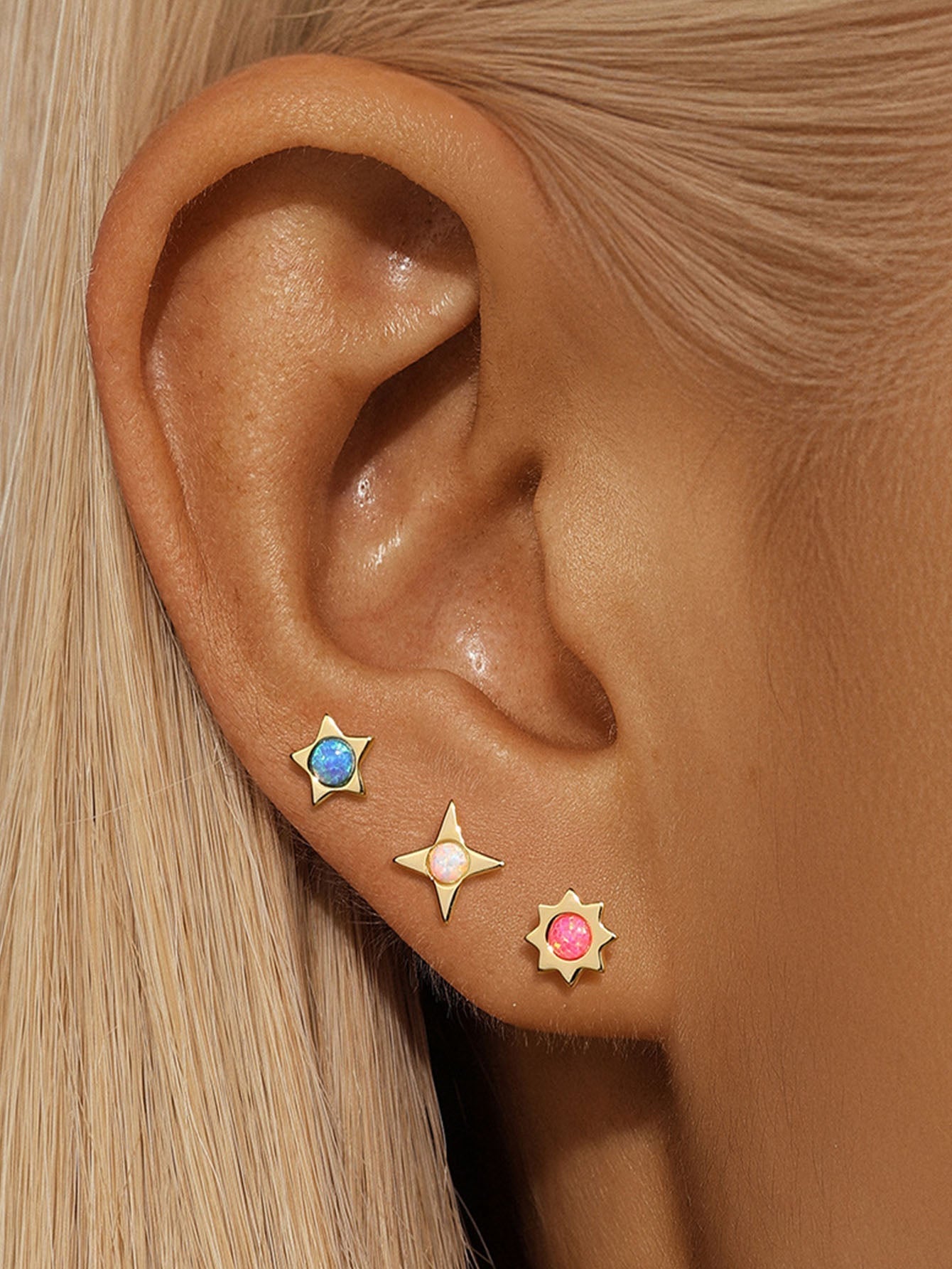 Celine – Gold filigree earrings.