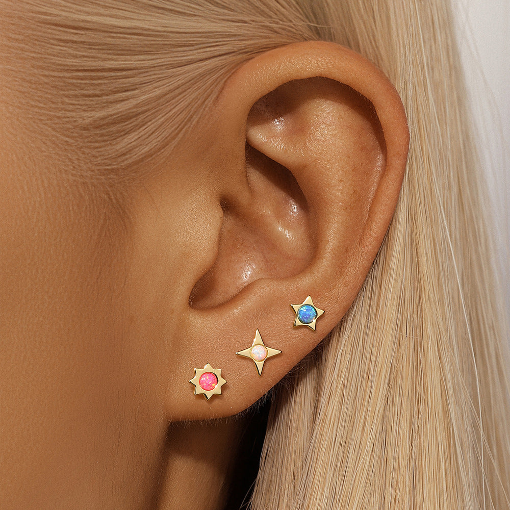 Celine – Gold filigree earrings.