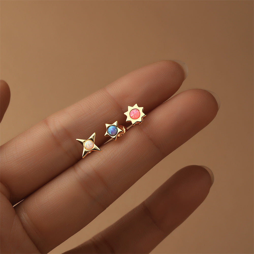 Celine – Gold filigree earrings.