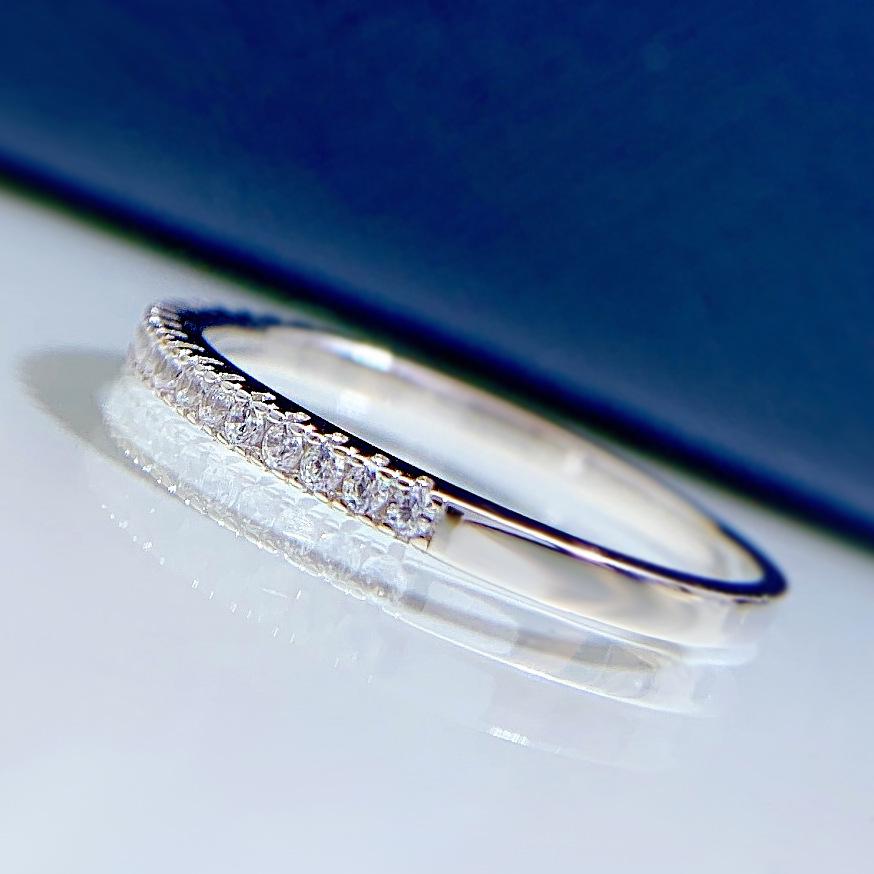 Alena – Narrow eternity ring with sparkling stones.