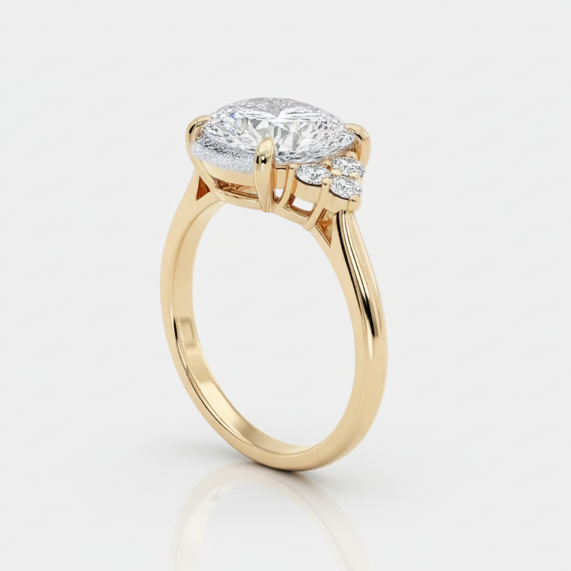 Clarissa – Pear Cut Diamond Ring in Gold.