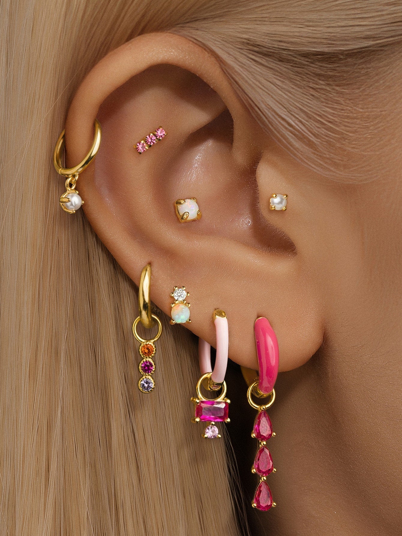 Elena – Gold earrings with a textured surface.