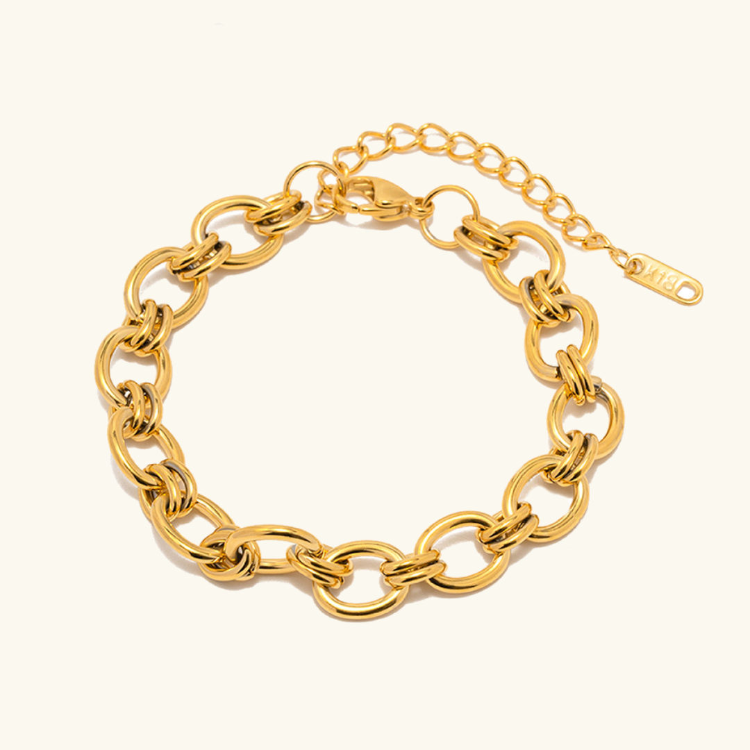 Johana – Delicate gold bracelet with charm details.
