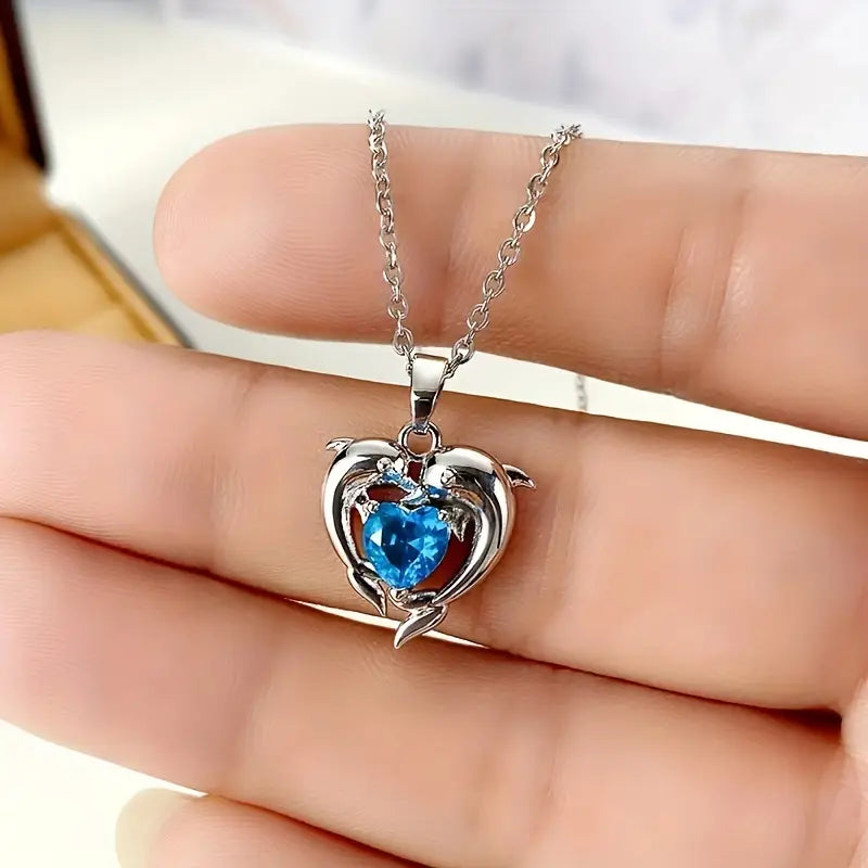 Amira – Heart-shaped pendant with sapphire.