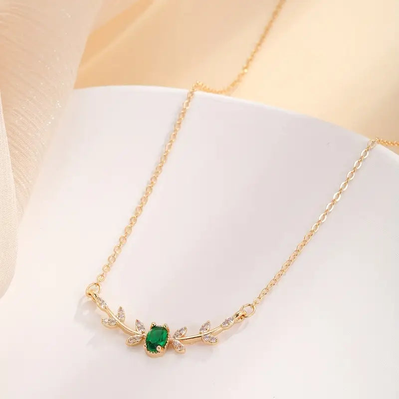 Klara – Double necklace with emerald pendant.