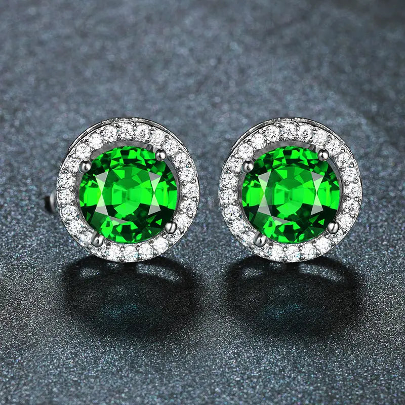 Selina – Emerald earrings with sparkling edge.