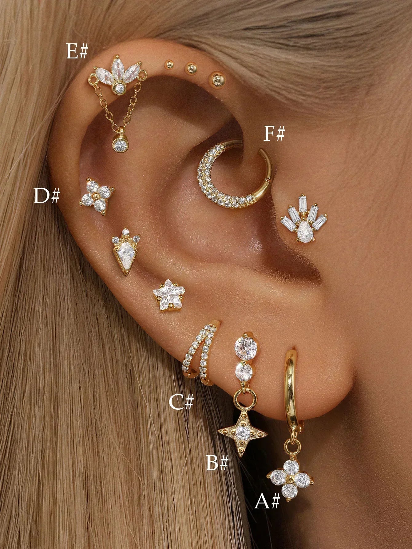 Helena – Gold earrings with an organic line.
