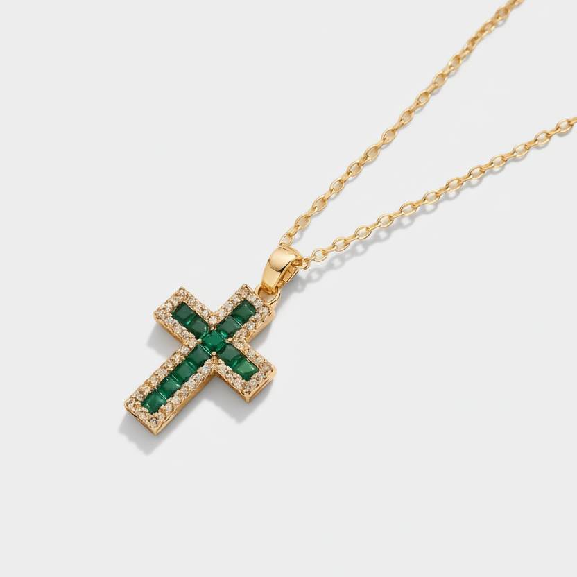 Alena – Cross pendant with emeralds.