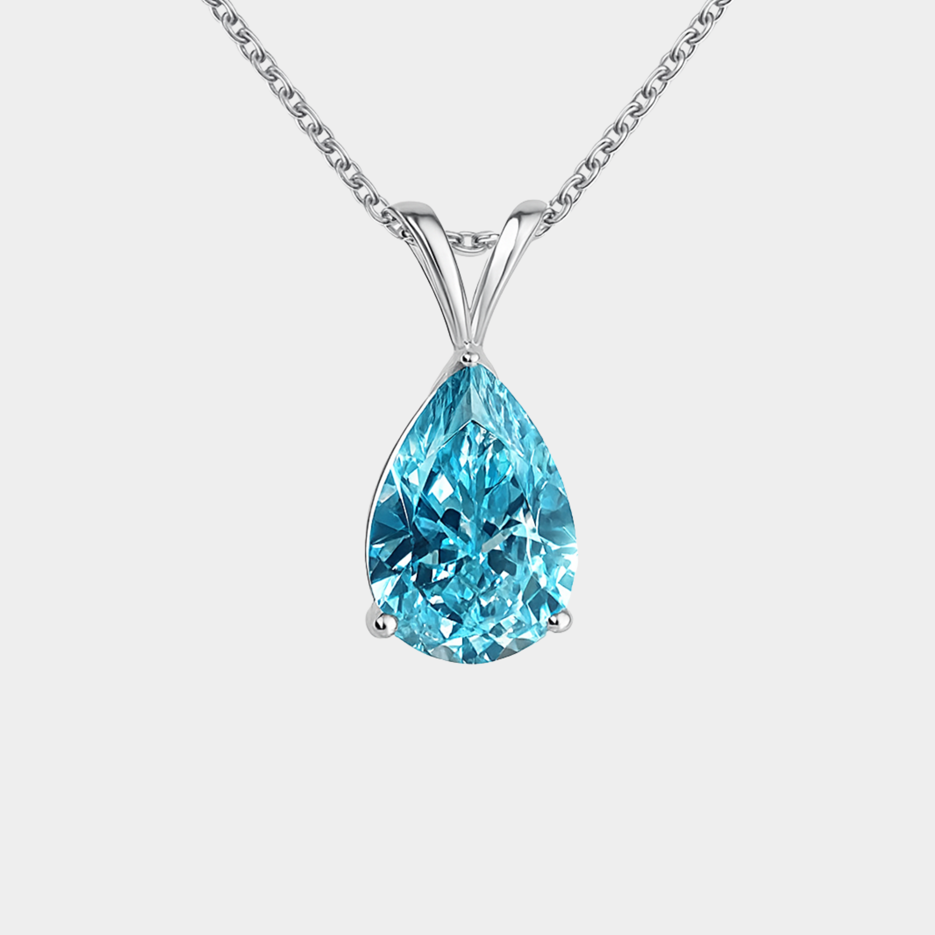 Melina – Silver necklace with blue pendant.