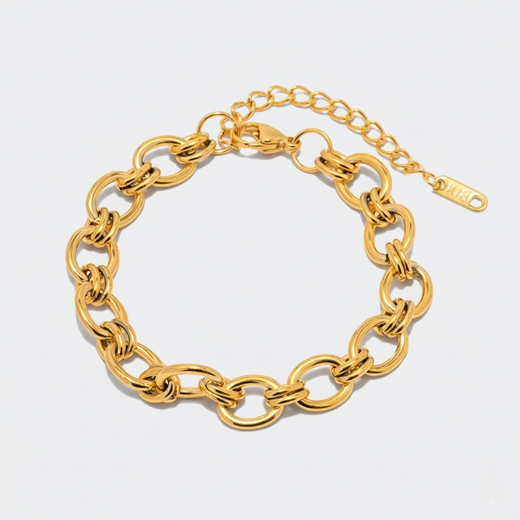 Johana – Delicate gold bracelet with charm details.