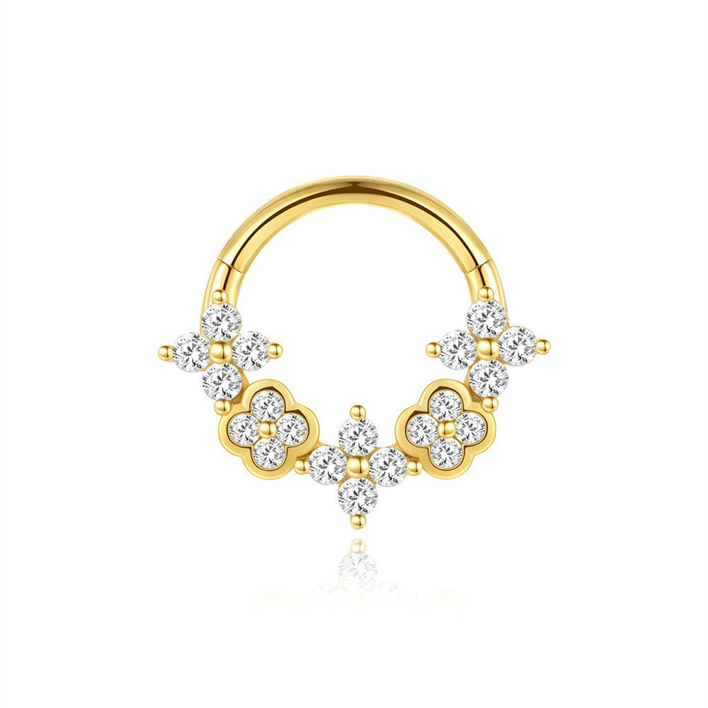 Johana-Marie – Gold earrings with a textured surface.