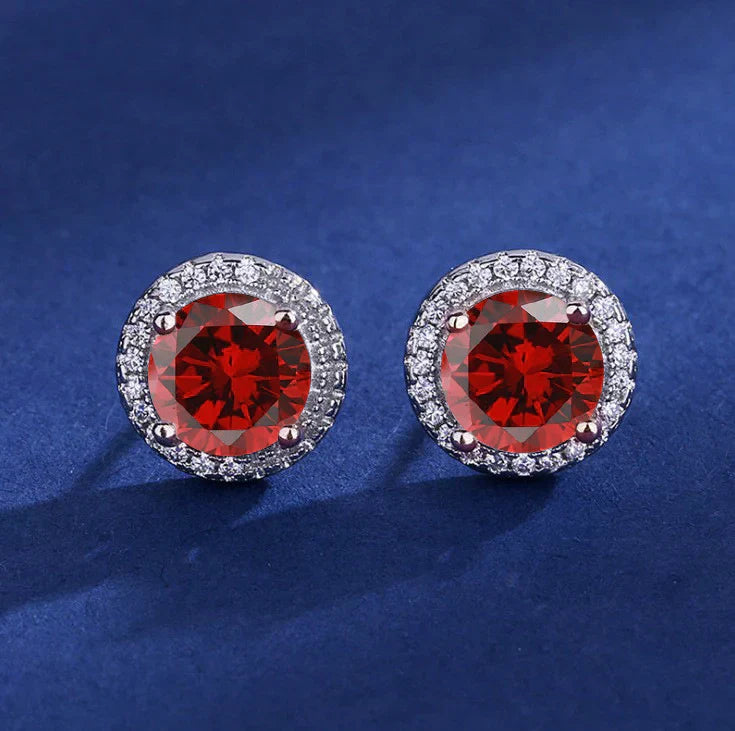 Luisa – Ruby earrings with sun motif.