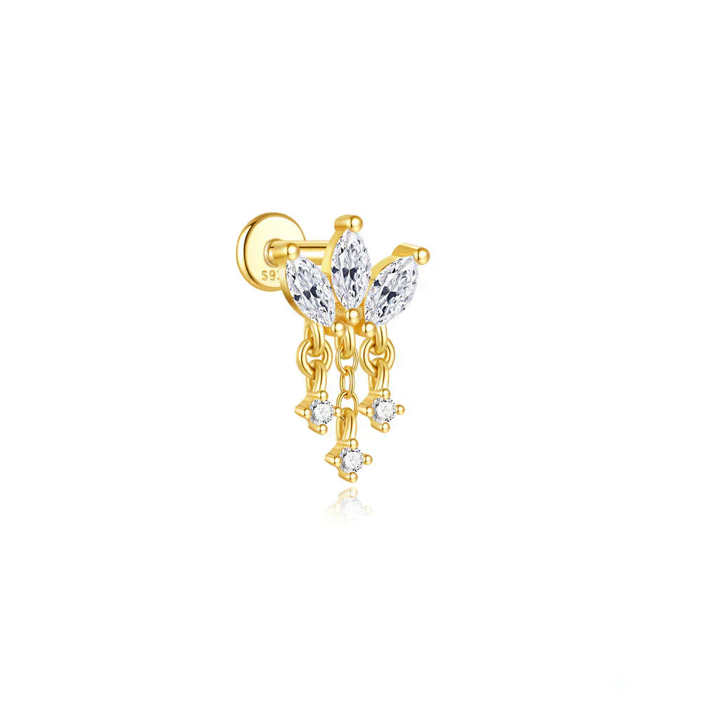 Johana-Marie – Gold earrings with a textured surface.
