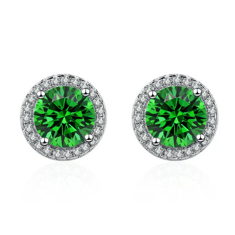 Selina – Emerald earrings with sparkling edge.