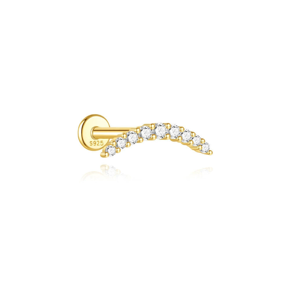 Johana-Marie – Gold earrings with a textured surface.