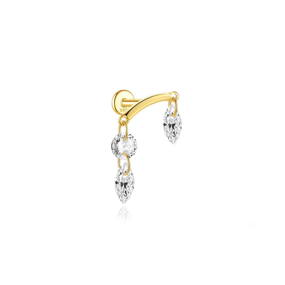 Johana-Marie – Gold earrings with a textured surface.