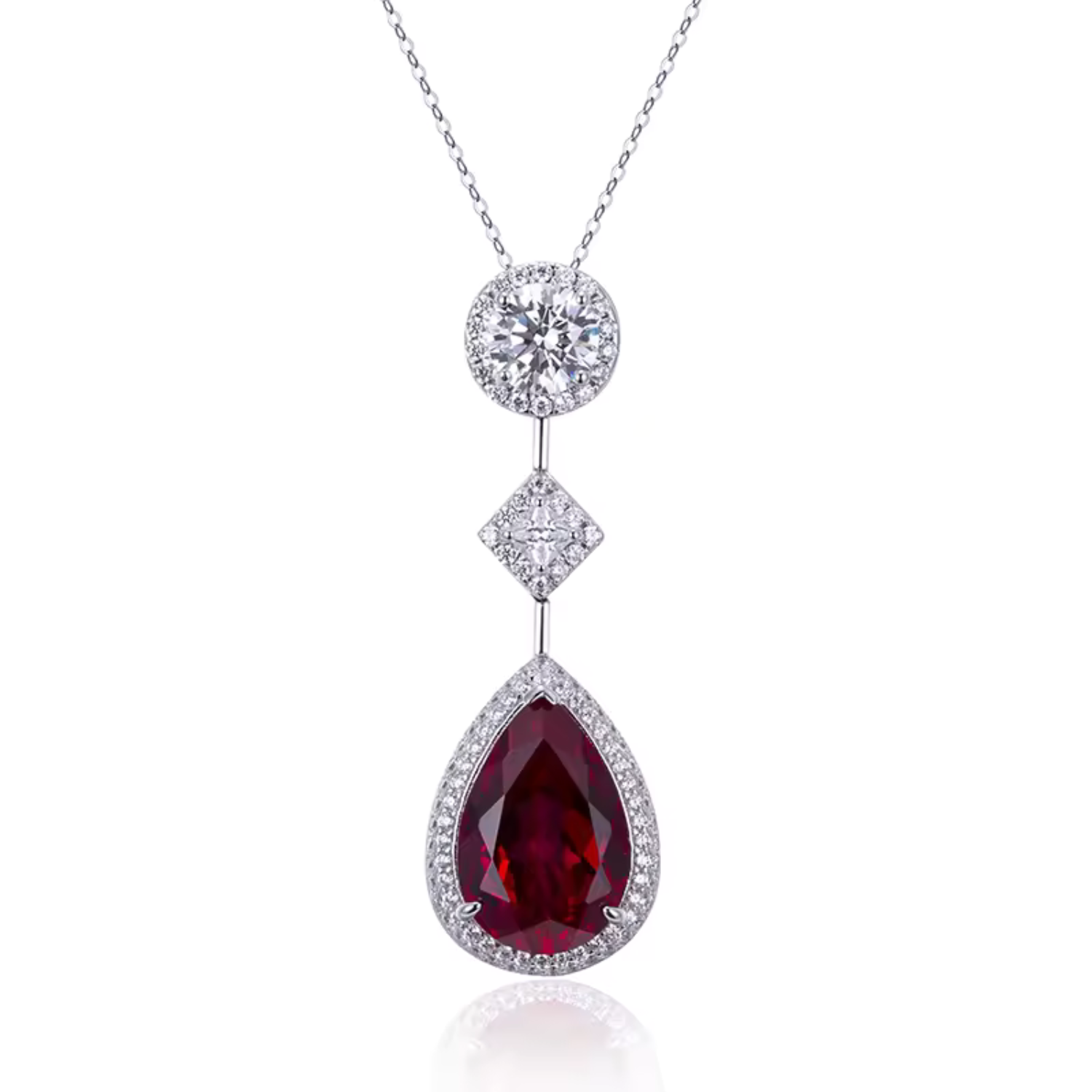 Pia – Pendant with ruby ​​and delicate crystal setting.