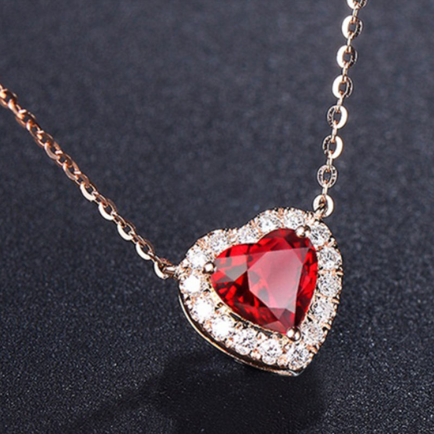 Romy – Silver necklace with ruby ​​heart.