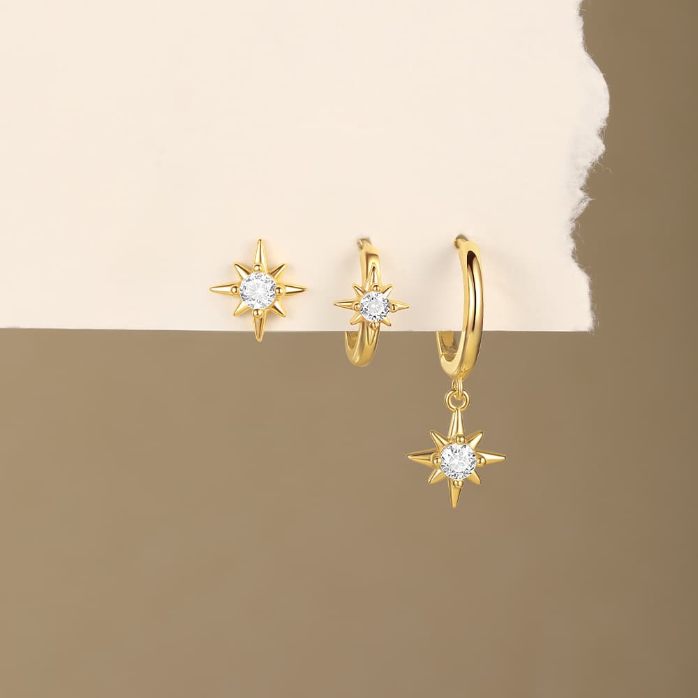 Nadina – Delicately curved gold earrings.