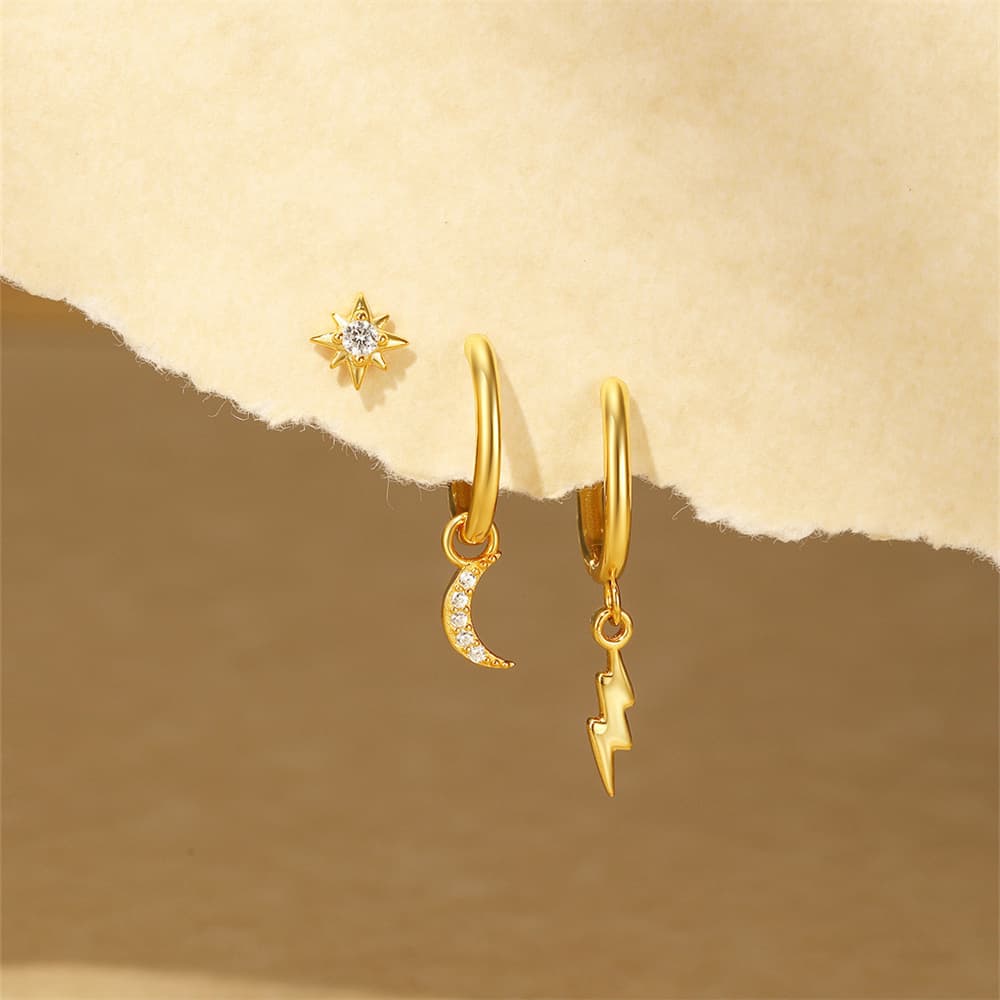 Elis – Delicate gold earrings with a soft line.