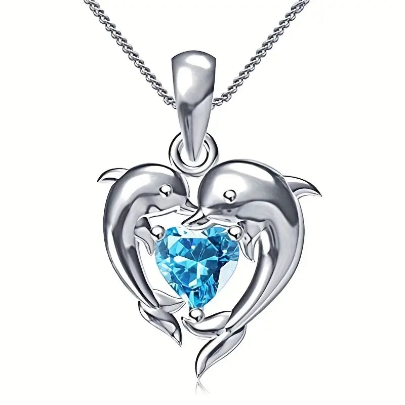 Amira – Heart-shaped pendant with sapphire.