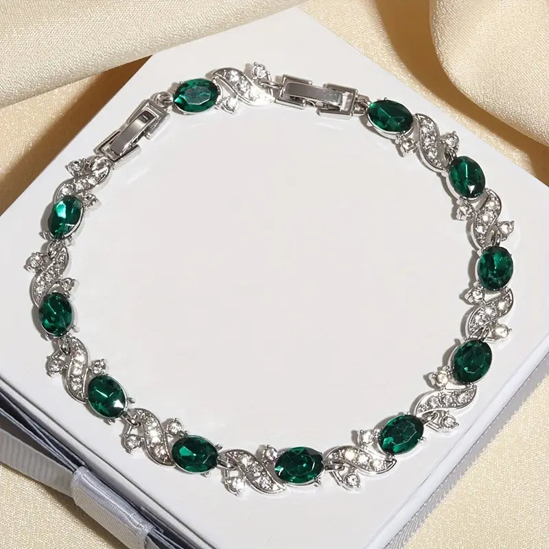 Helena – Silver bracelet with emeralds.