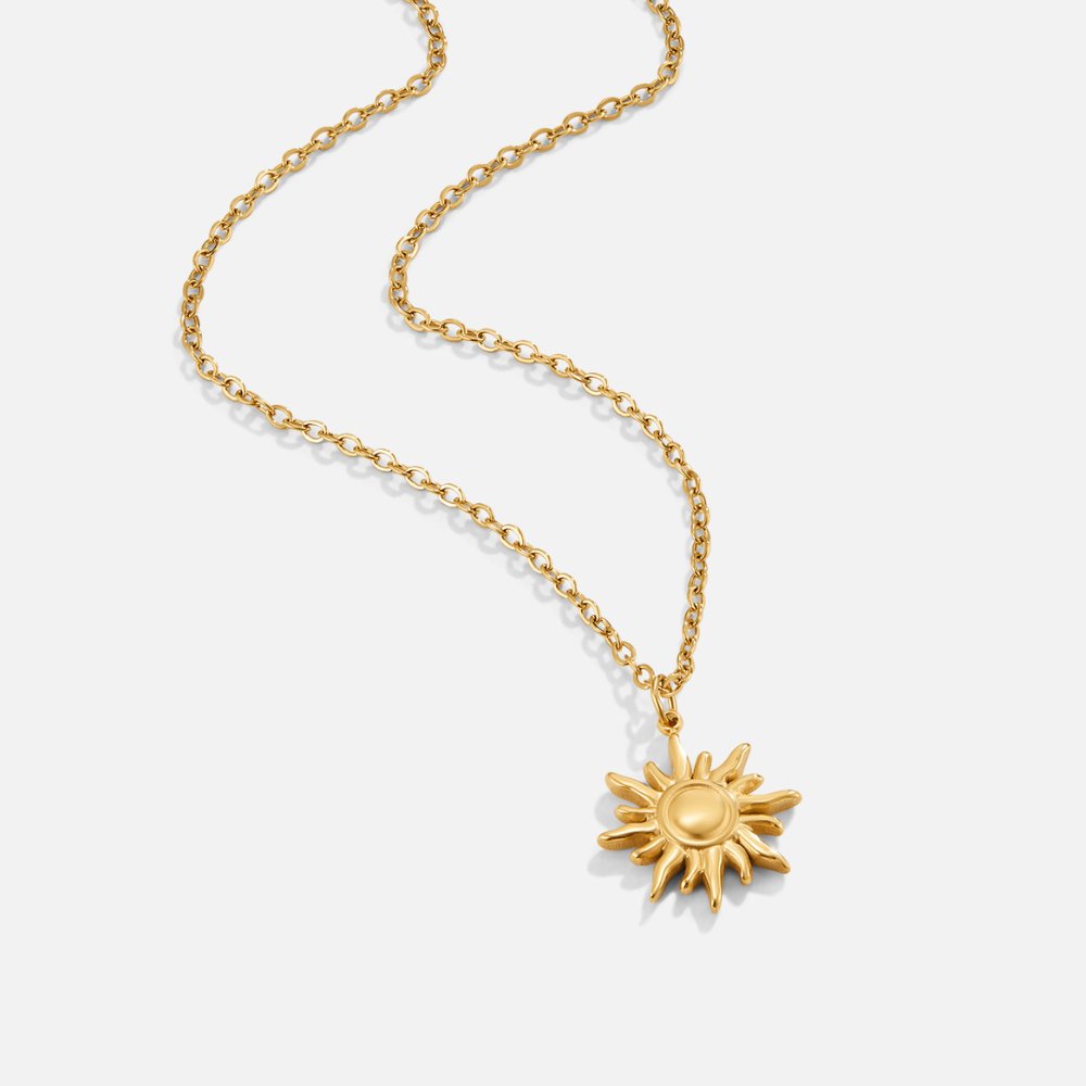 Ronja – Collana in oro con pendente a forma di fiore.