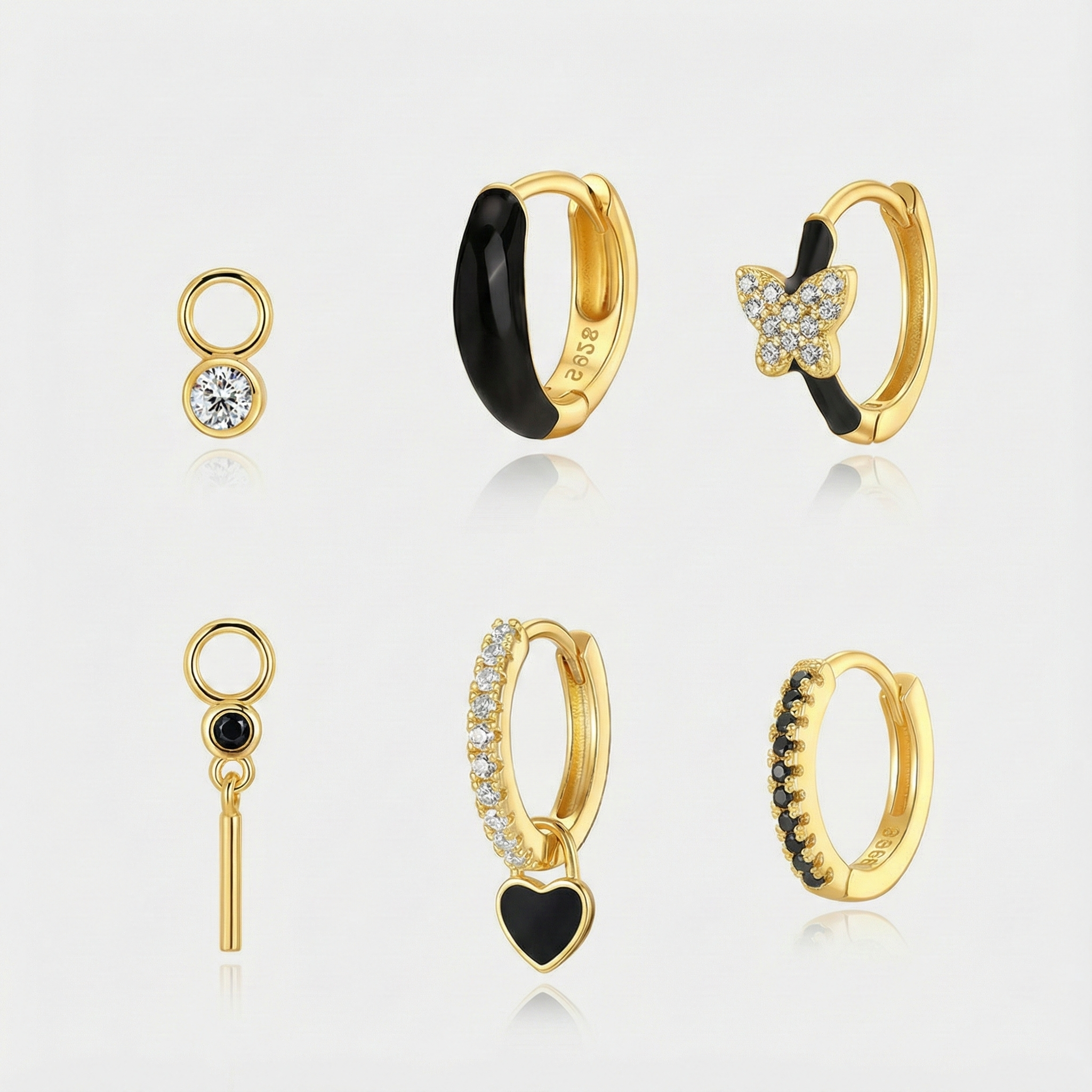 Theresia – Delicately curved gold earrings.